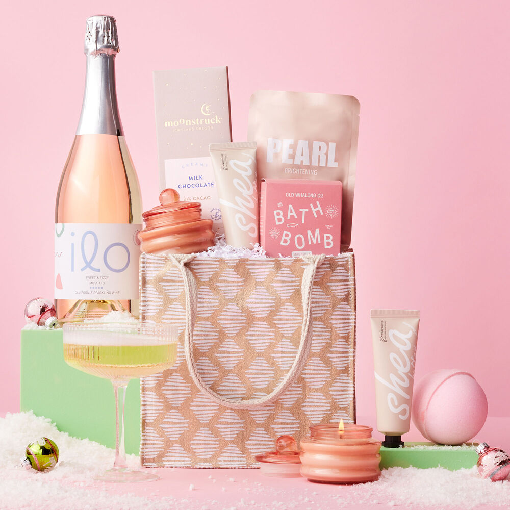 Say &quot;cheers&quot; with a chill and pampering holiday gift! This wine gift set includes mood-boosting items  image number null